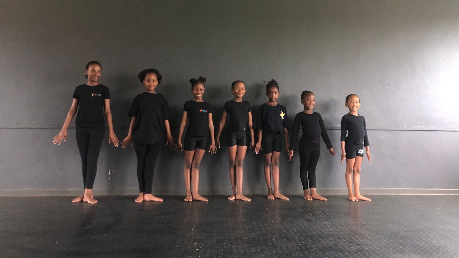Emerald gymnastics, gymnasts lining up looking gracefully